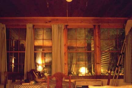 Stuga Windows inside at night - Rocky Run